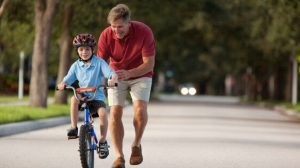 train a kid to ride a bike