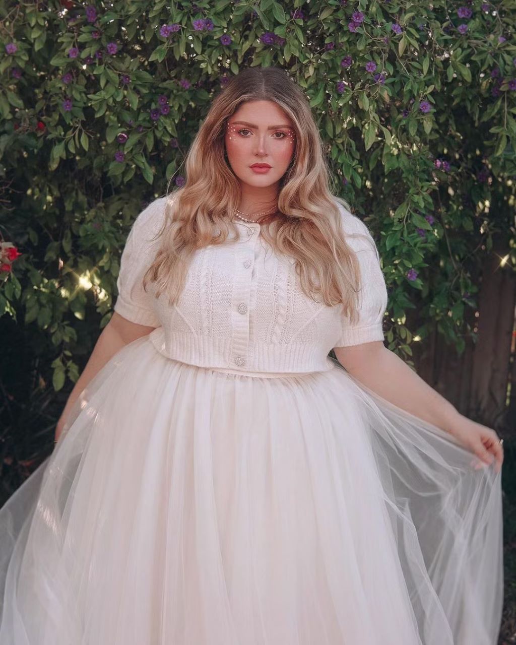What kind of top is flattering for plus-size?