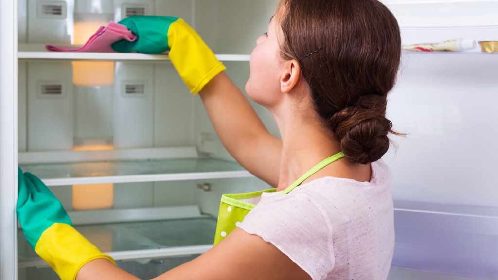 How do you deep clean a refrigerator at home