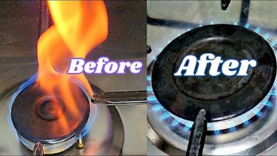 How do you fix orange flames on a gas stove