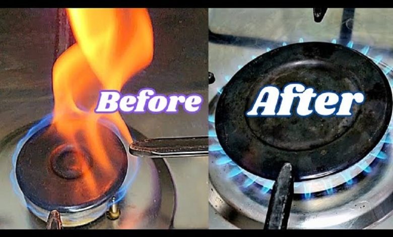 How do you fix orange flames on a gas stove