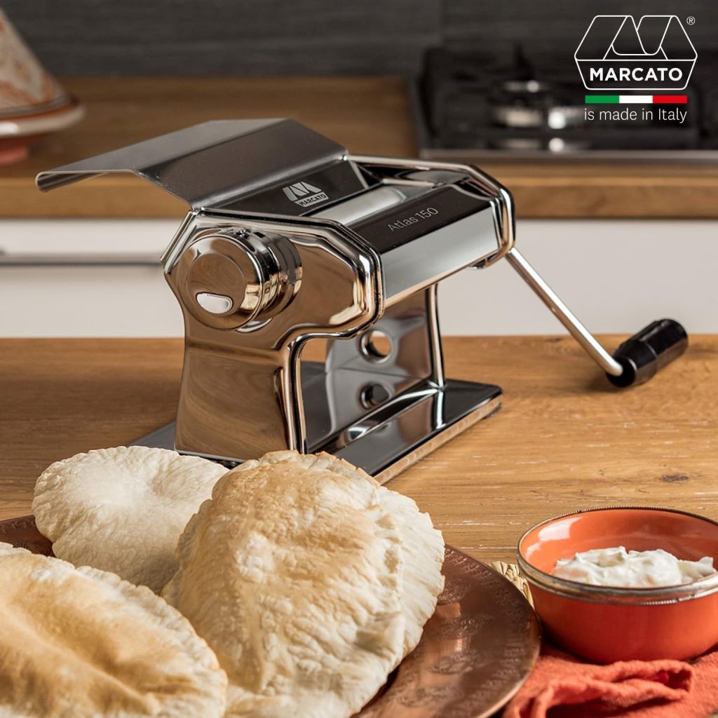 Marcato ravioli cutter attachment creating uniform homemade ravioli.