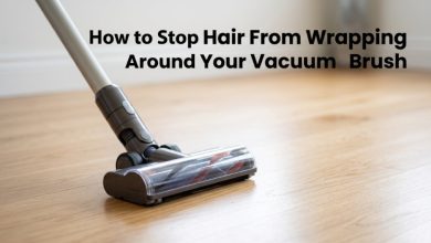 Featured image showing a vacuum head with the title: How to Stop Hair From Wrapping Around Your Vacuum Brush.
