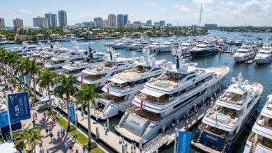 Rows of luxury superyachts docked along the floating marinas of the Superyacht Village during FLIBS 2026 in Fort Lauderdale, Florida