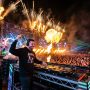 Crowd dancing under stage lights at an Orlando EDM festival