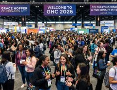 Thousands of women and non-binary technologists networking at the Grace Hopper Celebration 2026 conference floor