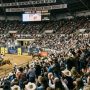 Crowds filling the arena stands during the National Western Stock Show rodeo event in Denver, Colorado