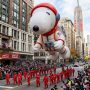 Massive helium balloon floating above crowds at the Macy's Thanksgiving Day Parade in New York City