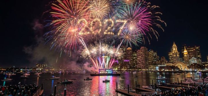 Colorful midnight fireworks exploding over Boston Harbor during First Night Boston 2027 on New Year's Eve